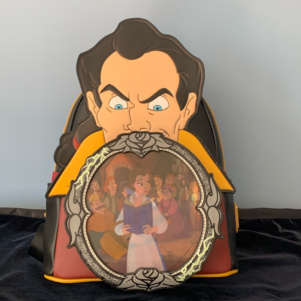Disney Loungefly Beauty and The Beast mini backpack.